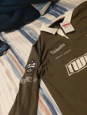 This Is A Micheal JORDAN FLIGHT Polo,it Is A Large But Fits more Like An Extra
